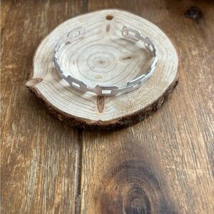 Matte silver adjustable chain cuff bracelet.